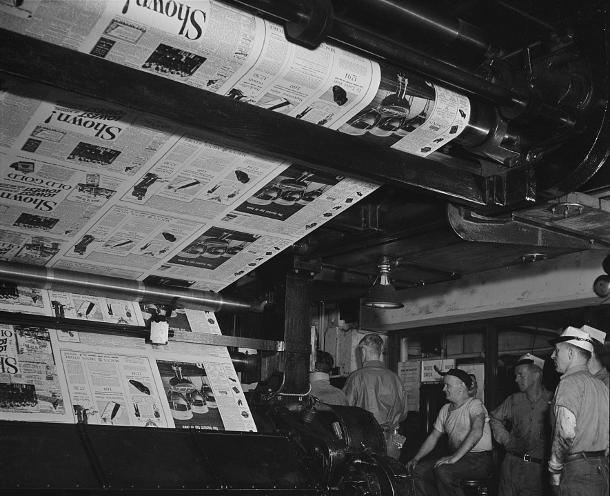 Newspapers come off the presses. 